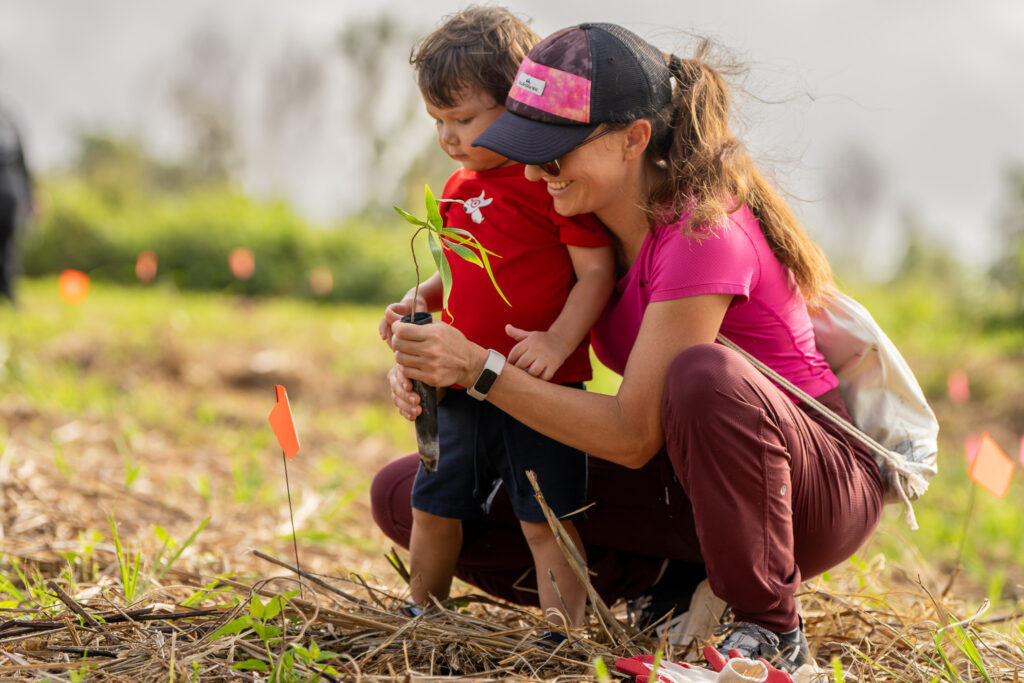 Families were among the many volunteers who participated in the final GROW in Malojloj event at the Ugum Watershed. GROW tree planting events are always open to the entire community and are expected to kick back up in the 2026 planting season.   