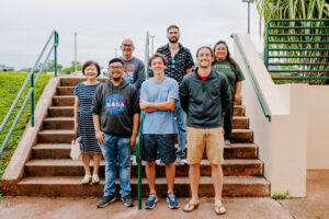 UOG NSF EPSCoR E-RISE's first graduate research assistant cohort with their faculty mentors. Front row L-R: Mark Galang, Alex Loria, and Joe Epler. Back row L-R: Dr. Hyunjin Oh, Dr. Bastian Bentlage, Dr. Michalis Mihalitsis, and Dr. Leslie Aquino. Not pictured: EPSCoR E-RISE GRA Robert Babac and faculty mentor Dr. Joo-Chul Yoon.
