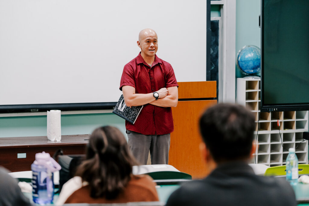 Michael L. Chan, Ed.D., Dean of the School of Technology & Student Services at Guam Community College and Co-Principal Investigator for Guam NSF EPSCoR E-RISE, speaks at the orientation for the 2026 Summer Math Research Experience (SMRE) program.