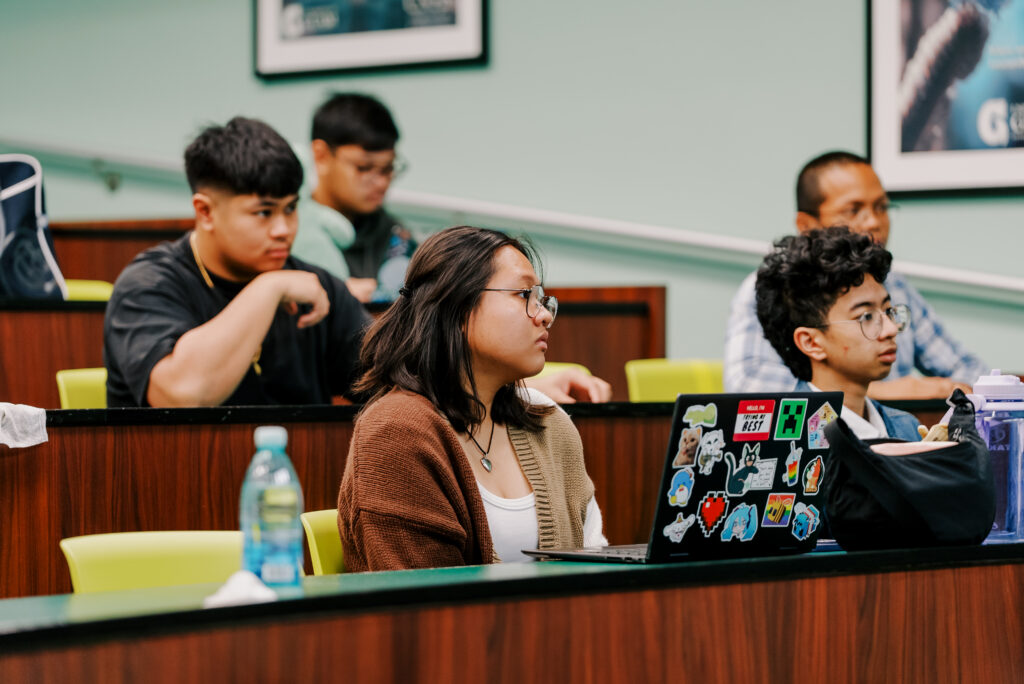 Participants of the 2026 Guam NSF EPSCoR Summer Math Research Experience (SMRE) listen during the program orientation. 