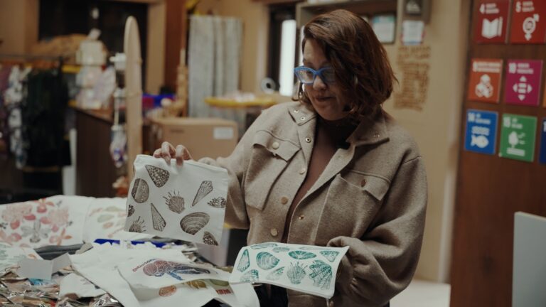Abby Crain, G3 Makerspace & Innovation Hub coordinator, holds hand-carved stamps of Guam’s flora and fauna.